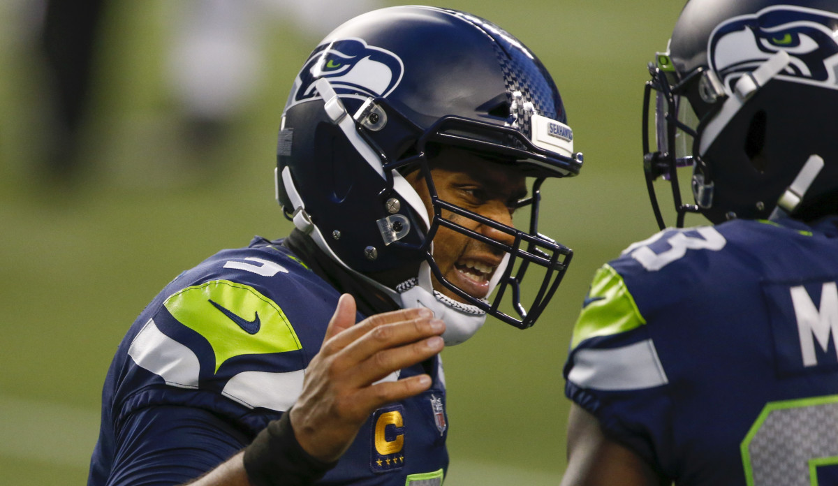 Seattle Seahawks quarterback Russell Wilson (3) reacts after throwing a touchdown pass against the New England Patriots during the third quarter at CenturyLink Field.
